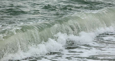 Wave in the sea with splashing water. Abstract background