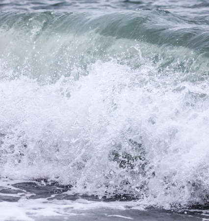 Wave in the sea with splashing water. Abstract background