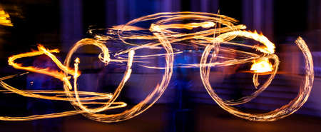 Flame of fire in motion at night. Abstract backgroundの写真素材