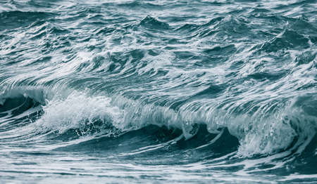 Wave in the sea with splashing water. Abstract background