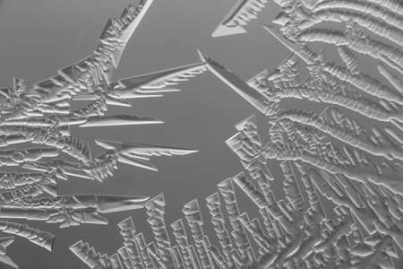 Patterns from frost on glass as a background. Close-upの写真素材