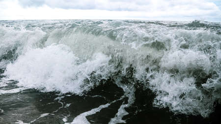 Wave in the sea with splashing water. Abstract backgroundの写真素材