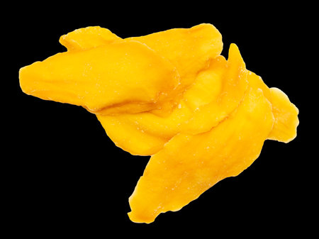 Dried mango isolated on black background. Close-upの写真素材