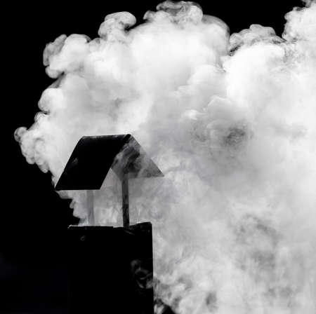 White smoke from the chimney.の写真素材