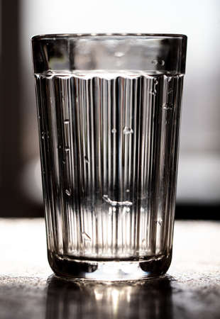 Faceted glass on the table. Close-upの写真素材