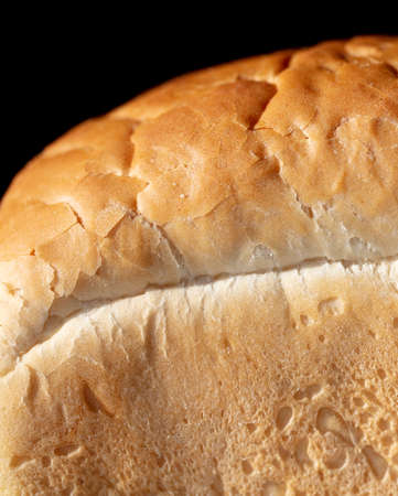 Fresh bread made from wheat flour. Close-up.