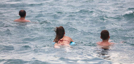 People swim in the water of the sea.の写真素材