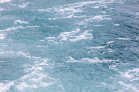 Smooth blue sea water as an abstract background.の写真素材