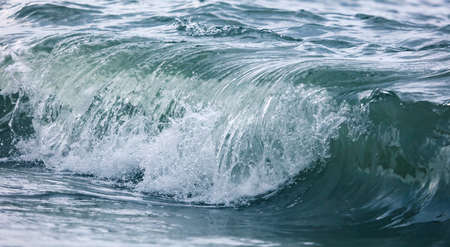 Wave in the sea with splashing water. Abstract backgroundの写真素材