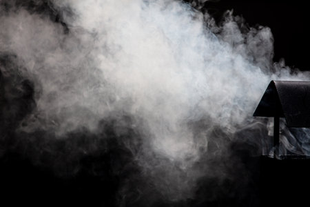White smoke on a black background.の写真素材