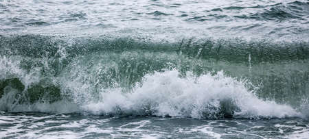 Wave in the sea with splashing water. Abstract background
