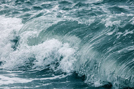 Wave in the sea with splashing water. Abstract backgroundの写真素材