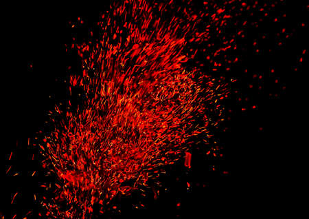 Sparks from fire on a black background.