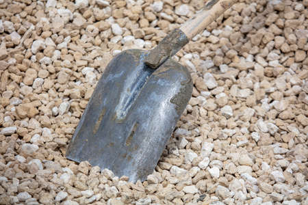 The shovel lies on the rubble. Constructionの写真素材