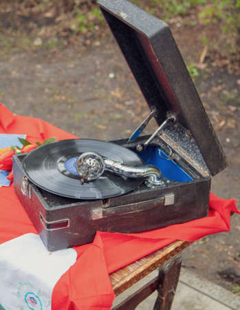 Lipetsk, Russia -May 9, 2021: Turntable on the table in the park. Holiday Victory Day over fascist Germany.のeditorial素材