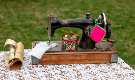 Lipetsk, Russia -May 9, 2021: Sewing machine on the table in the park. Holiday Victory Day over...