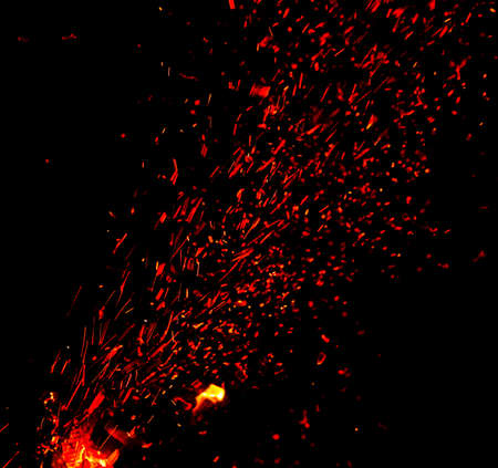 Sparks from fire on a black background.