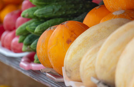 Ripe melons on the counter in the market.の写真素材