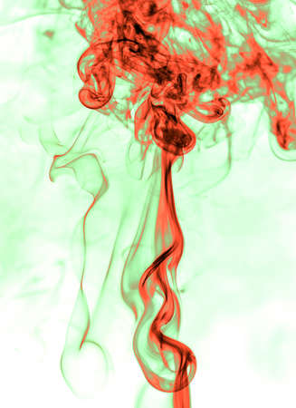 Red and green smoke on a white background. Abstractionの写真素材