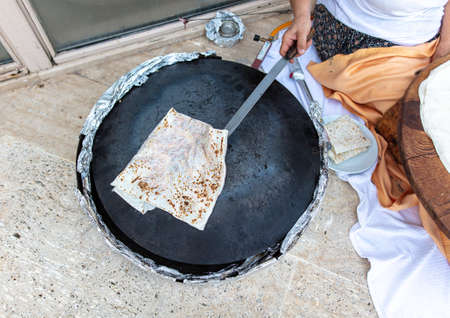 The woman is preparing gÃ¶zleme. Turkish foodの写真素材