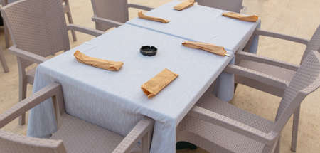 Table with cutlery in the restaurant.の写真素材