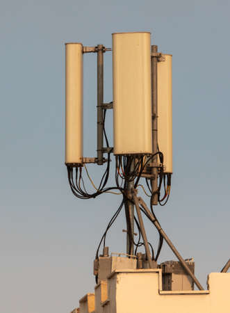 Cellular antenna on the roof of the house.