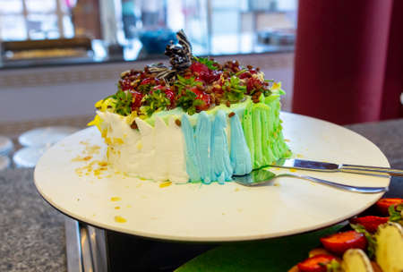 Sweet cake on a shelf in a cafe. Foodの写真素材