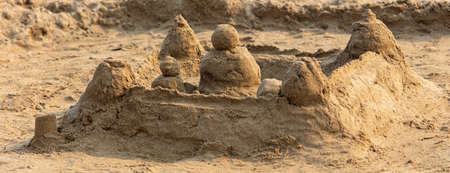 Sand buildings on the beach by the sea.の写真素材