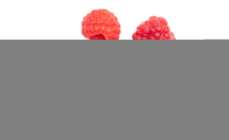 Red raspberries on a white background. Close-upの写真素材