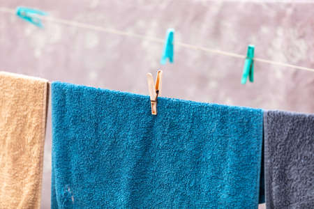 The towel is dried on a clothesline. Close-upの写真素材