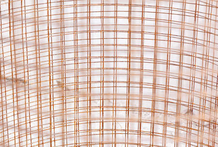 Rusty metal mesh as background. Close-up