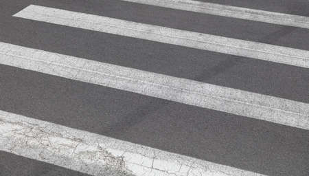 White stripes on the asphalt as a background. Crosswalkの写真素材