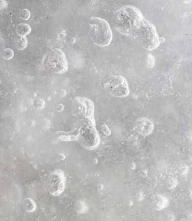 Frozen crystals of snow and ice as an abstract background. Texture