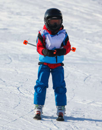 A man is skiing in the snow in winter.の写真素材