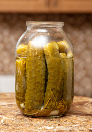 A jar of pickles on the table. Close-upの写真素材