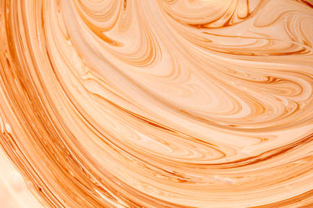 Mixing water dispersion paint of different colors. Abstract backgroundの写真素材