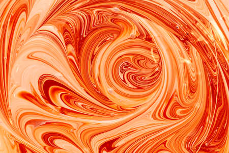 Mixing of red and white water-based paint. Abstract background