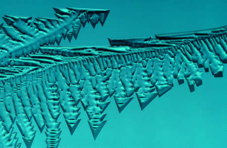 Drawings of ice on blue glass. Abstract background
