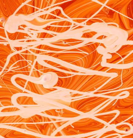 Mixing water dispersion paint of different colors. Abstract backgroundの写真素材