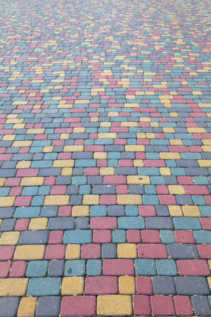 Multicolored paving slabs as an abstract background. Texture
