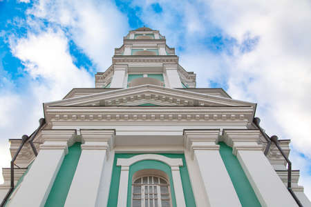 Windows and walls in a historic building against the sky.の写真素材