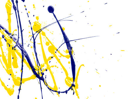 Drops of yellow and blue paint on a white paper background. Close-upの写真素材