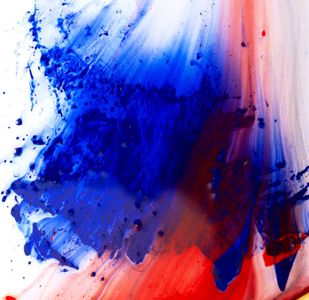 Drops of red and blue paint on a white background. Abstractionの写真素材