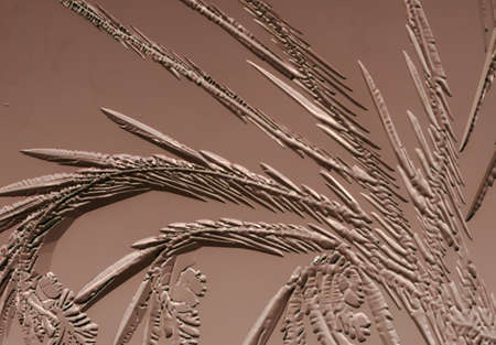 Blue patterns from frost on glass as a background. Close-up