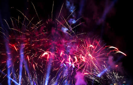Fireworks at night as background. Festive texture