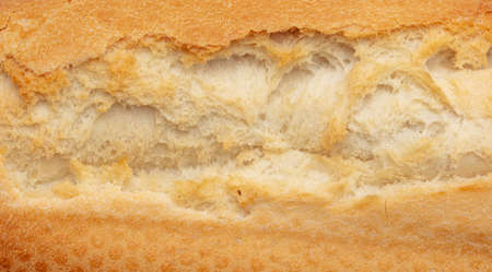 Rusty crust of bread as a background. Texture
