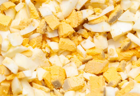Sliced boiled eggs as a background. close-upの写真素材