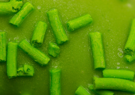 Confetti on green donut as background. Macroの写真素材