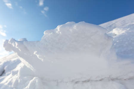 White snow against the blue sky. nature in winterの写真素材