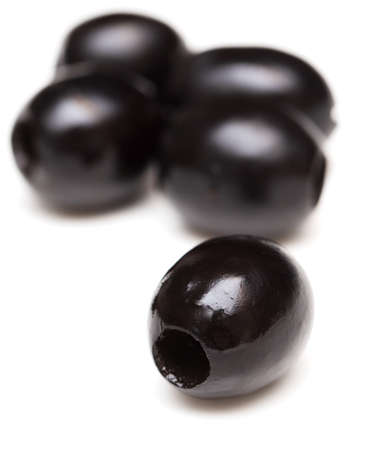Black olives isolated on a white background. close-upの写真素材